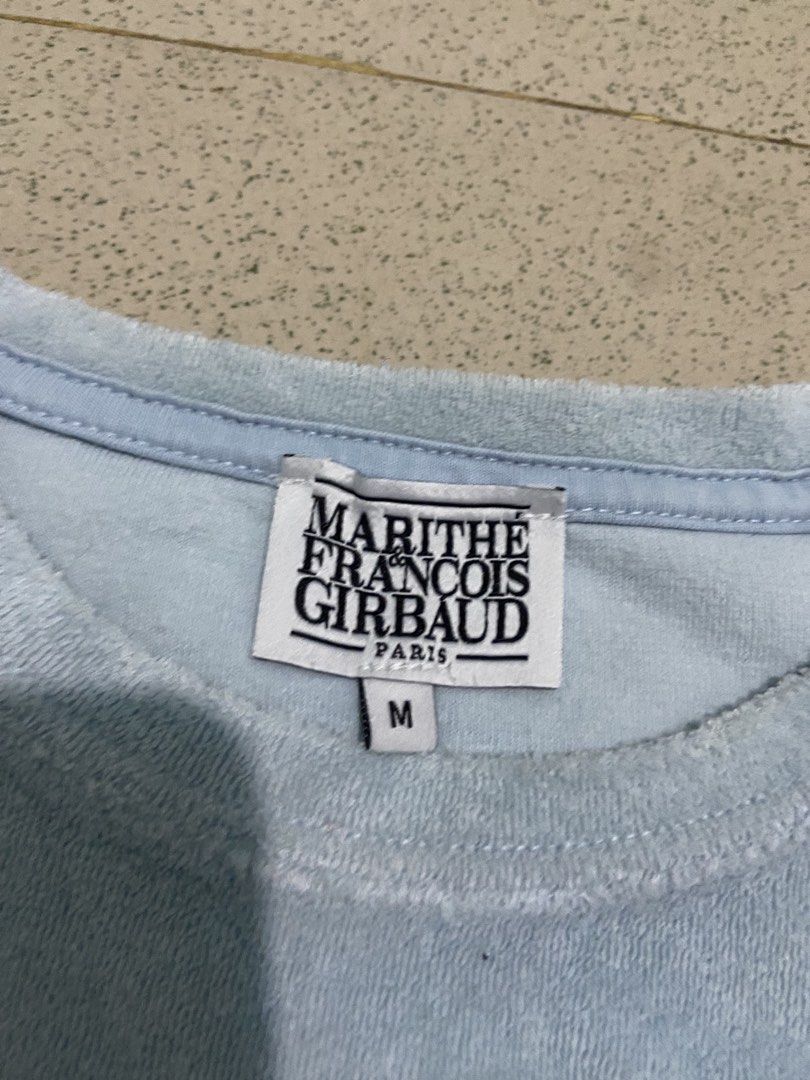 Marithe Francois Girbaud Light Blue Terry Cloth T-Shirt Size M (Category: Tshirts & Polo Shirts ) located in Bulacan. Submitted by rrthrifts (Listing ID 1462353805, Image 3). Description: - Brand: Marithe Francois Girbaud - Color: Light Blue - Material: Terry Cloth (Cotton & Polyester Blend) - Features: Embroidered chest logo, neck tag logo - Size: Medium (M) - Style: Casual wear.