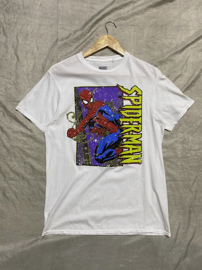 Marvel Spider-Man Graphic T-Shirt (Category: Tshirts & Polo Shirts ) located in Davao. Submitted by chazethrift (Listing ID 1462351248, Image 1). Description: - White Marvel T-shirt - Features a cool Spider-Man graphic print (Spidey swinging through the city) - Made from 100% cotton - Size: Medium - Ideal for any Marvel fan.