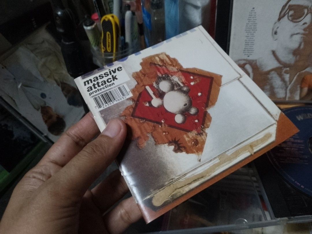 Massive Attack "Protection" Album CD (Category: CDs & DVDs) located in Quezon City. Submitted by akosiluna44 (Listing ID 1462415684, Image 1). Description: EUC Rare CD from Massive Attack Pre-owned Location - Quezon City printed in Holland (Netherlands) #massiveattack #protection #triphop #90smusic #cd.