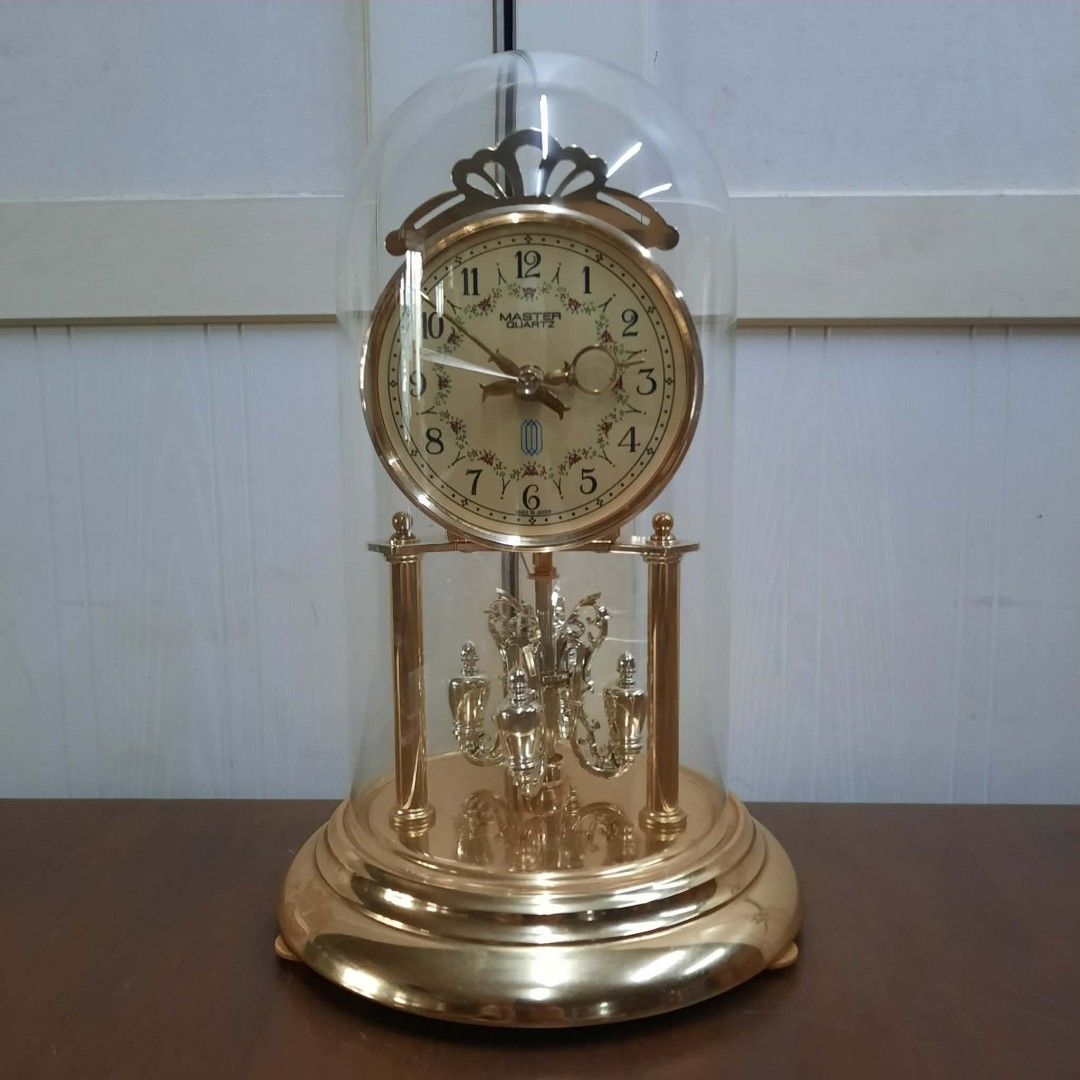 Master Quartz Dome Clock with Pendulum (Category: Clocks) located in Manila. Submitted by ivan_furnitures421 (Listing ID 1462278258, Image 3). Description: - Vintage Master Quartz clock - Features a glass dome - Swinging pendulum - Elegant brass-tone finish - Works perfectly - Ideal for desk or shelf display - Adds a classic touch to any room.