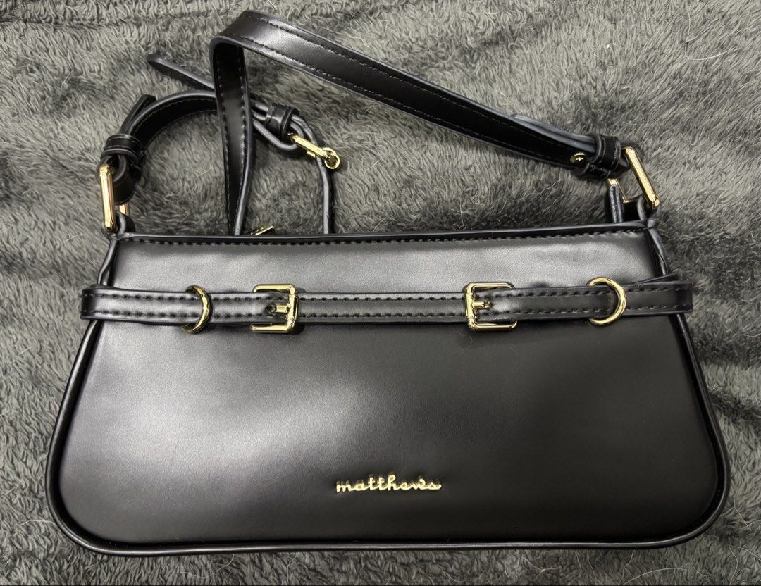 Matthews Thaddeus Shoulder Bag, BLACK (Category: Shoulder Bags) located in Quezon City. Submitted by clutter_busters (Listing ID 1462314343, Image 1). Description: Matthews Black Shoulder Bag, Thaddeus - Includes dust bag for storage and an additional strap - Used once. Good as new - RFS, not my style anymore - shipping Lalamove/J&T.