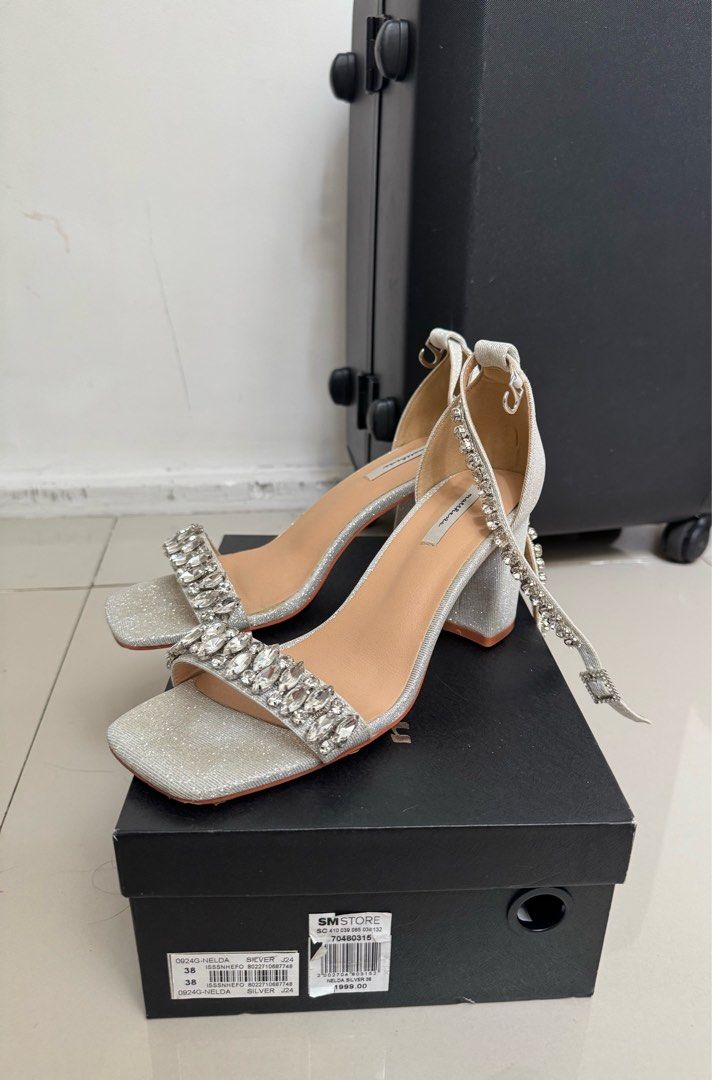 Matthews Silver Embellished Block Heels (Category: Heels) located in Quezon City. Submitted by d.archive (Listing ID 1462433379, Image 3). Description: Matthews Pamela Heels Sandals Used once to an event 38 Sparkly silver block heels with rhinestone straps. Buckle ankle strap, chunky heel for comfort. Great for parties/special occasions. Original box included. RFS: a bit big for me.