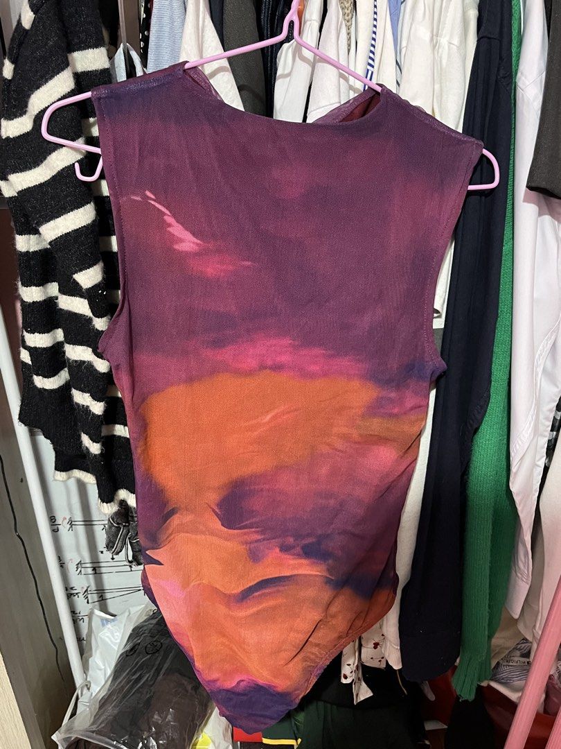 Mesh Sunset Print Sleeveless Bodysuit (Category: Sleeveless) located in Valenzuela. Submitted by skiesrc (Listing ID 1462312209, Image 1). Description: - Vibrant sunset print mesh bodysuit - Sleeveless design - Sheer and lightweight fabric - Flattering cut - Versatile for layering or wearing solo - Unique, eye-catching design.
