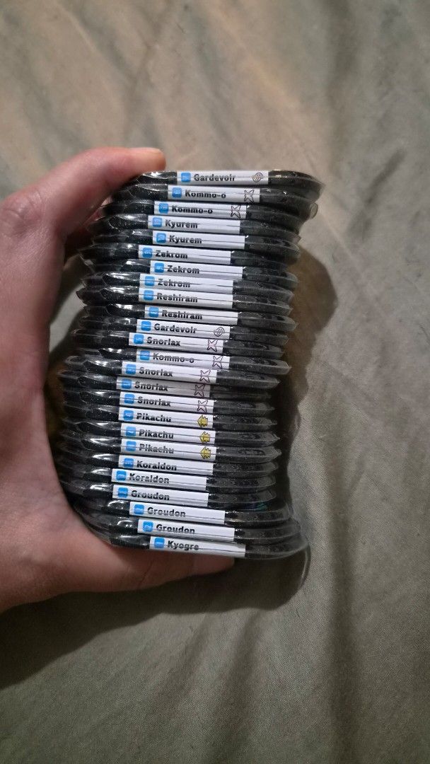 Metastar V2 Black tag set (with dupes) (Category: Raw Singles) located in Bulacan. Submitted by lemonbirb (Listing ID 1462428568, Image 1). Description: Quitting sale! Price is negotiable :D All tags are sleeved as soon as I got it. Bundle includes: 2x Koraidon 1× Kyogre 3x Groudon 3x Pikachu 4x Snorlax 3x Kommo-o 2x Gardevoir 2x Reshiram 3x Zekrom 2x Kyurem ...and a bunch of freebie mezatags Meet up (SM Marilao, Trinoma, Sm North) and delivery (