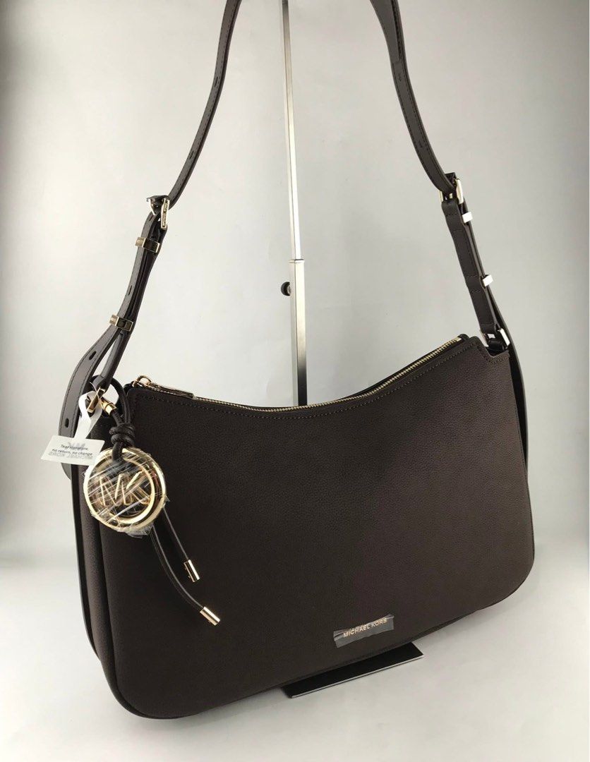 Michael Kors Nolita Medium (Category: Shoulder Bags) located in Binan City. Submitted by pinkykeenshop (Listing ID 1462437750, Image 2). Description: .