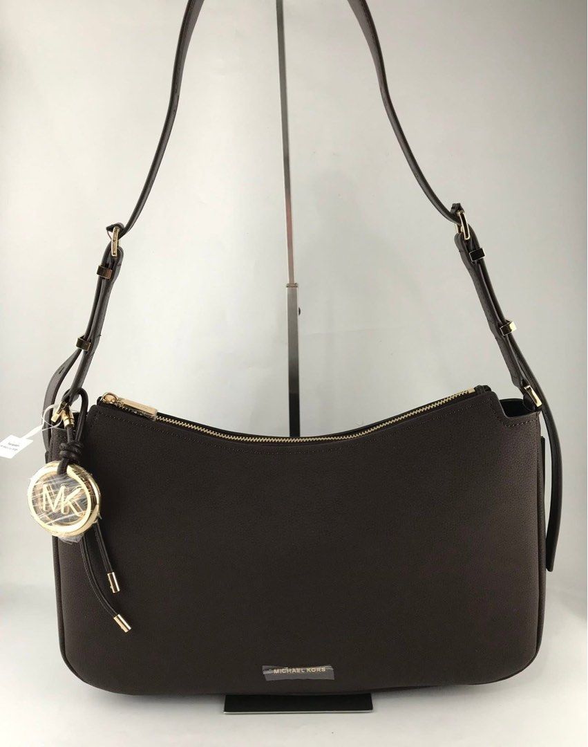 Michael Kors Nolita Medium (Category: Shoulder Bags) located in Binan City. Submitted by pinkykeenshop (Listing ID 1462437750, Image 1). Description: .