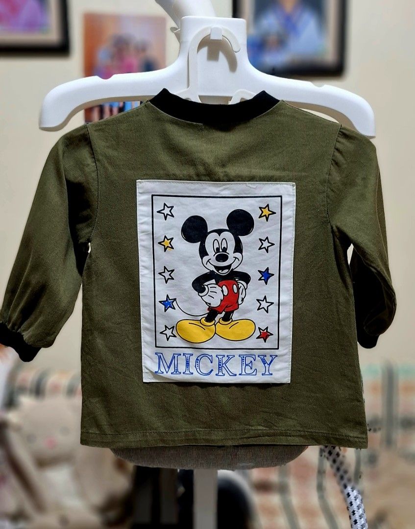 Mickey bomber jacket (Category: Babies & Kids Fashion) located in Quezon City. Submitted by thetetajabakes (Listing ID 1462380669, Image 2). Description: - preloved ( may konting kupas ) - outgrown clothes - RFS : Decluttering.