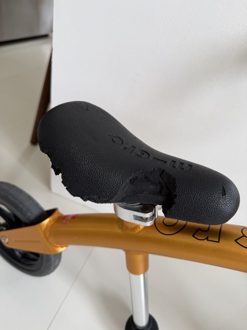 Micro Balance Bike - Orange/Gold (Category: Bicycles) located in Bacoor. Submitted by cts217 (Listing ID 1462311908, Image 2). Description: - Gold Micro balance bike - Perfect for teaching kids to balance - Overall good condition but saddle is crumbling due to prolonged storage.