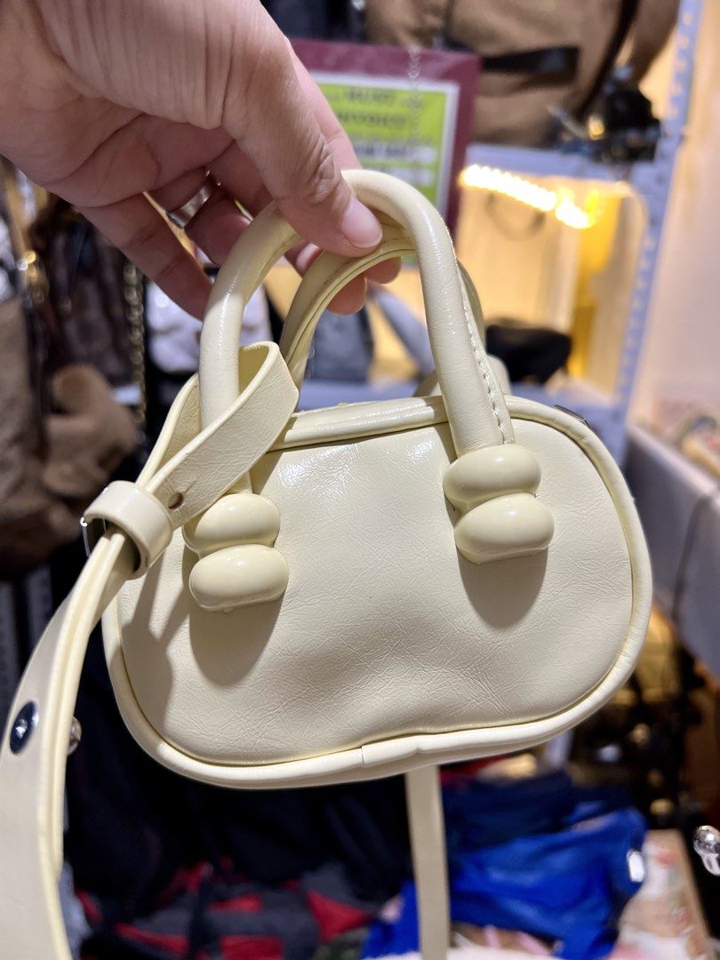 Milky Leather Micro Sling Bag (Category: Cross-body Bags) located in Rizal. Submitted by babamamanyingonlineshop (Listing ID 1462275392, Image 1). Description: .