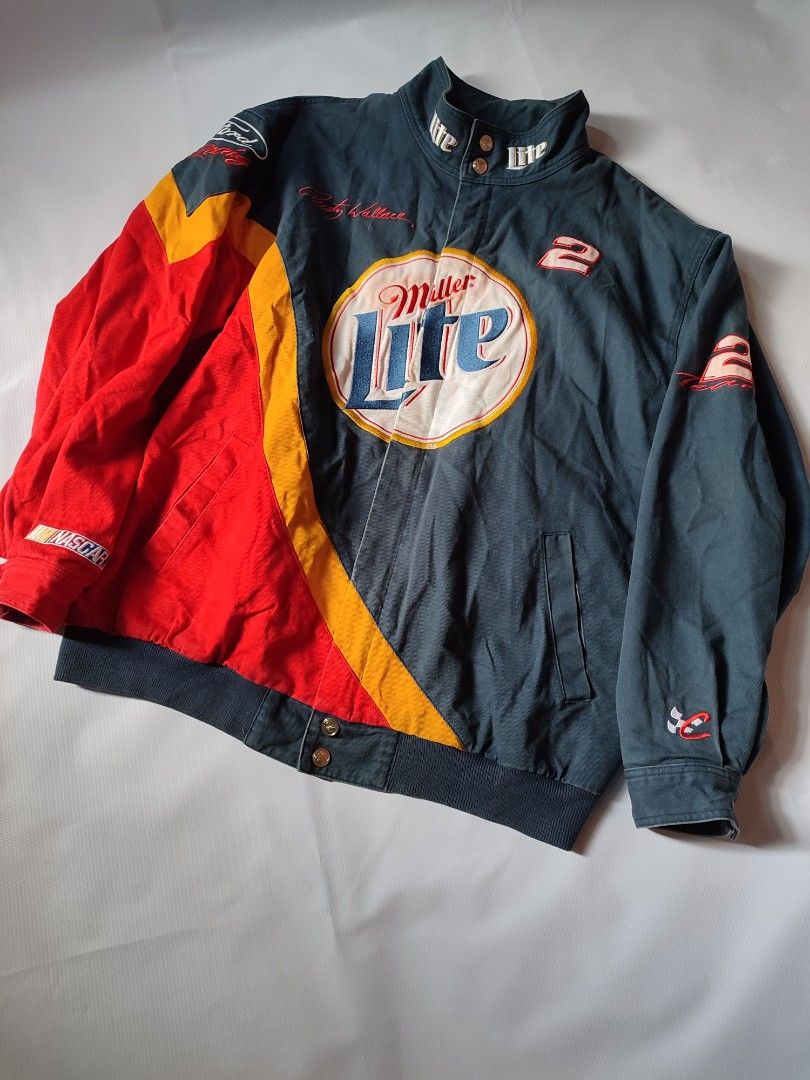 Miller Lite NASCAR Racing Jacket Rusty Wallace #2 (Category: Coats, Jackets and Outerwear) located in Puerto Princesa. Submitted by thriftedsoulsy2k (Listing ID 1462296884, Image 1). Description: - Vintage Miller Lite jacket - Features Rusty Wallace #2 - Iconic Miller Lite logo - NASCAR Authentics tag inside - Made by VF Knitwear - Perfect for racing fans best fit to XL 25 width 30 length.