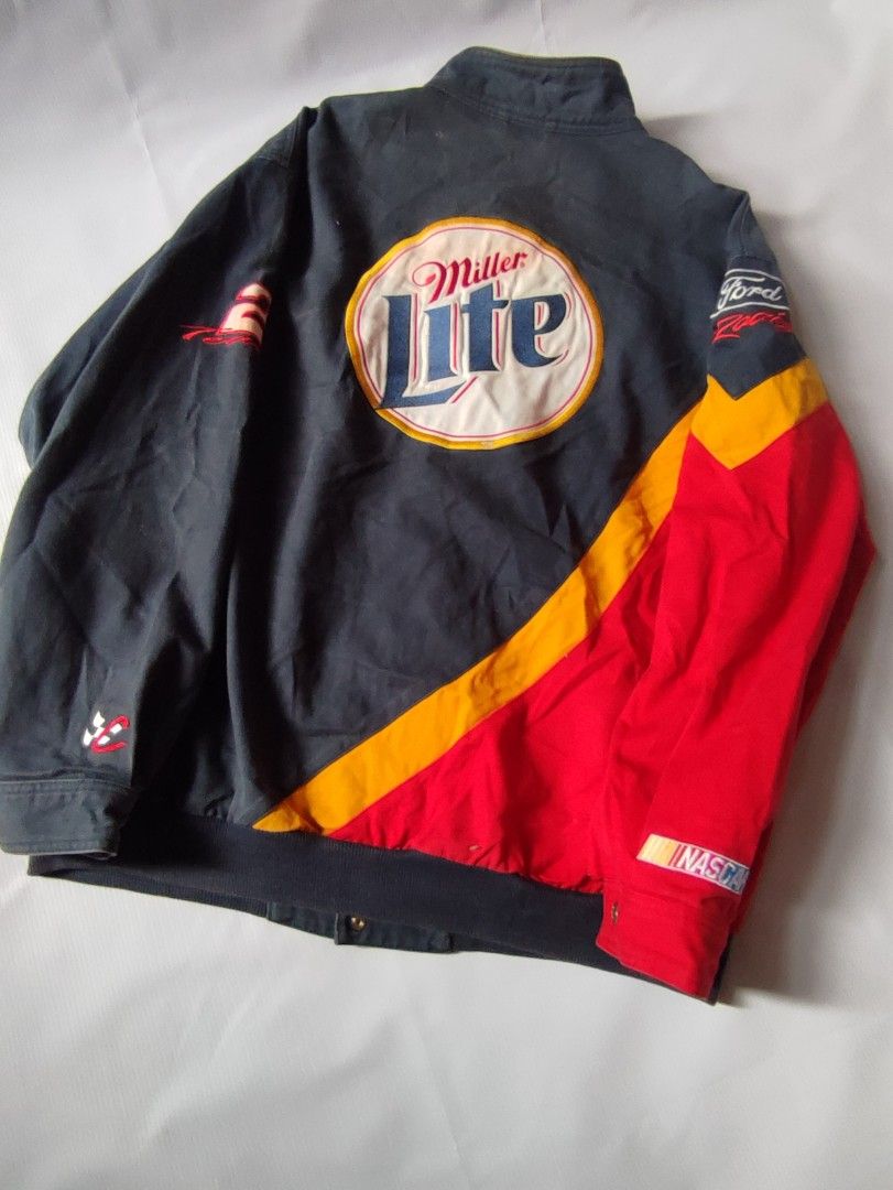 Miller Lite NASCAR Racing Jacket Rusty Wallace #2 (Category: Coats, Jackets and Outerwear) located in Puerto Princesa. Submitted by thriftedsoulsy2k (Listing ID 1462296884, Image 2). Description: - Vintage Miller Lite jacket - Features Rusty Wallace #2 - Iconic Miller Lite logo - NASCAR Authentics tag inside - Made by VF Knitwear - Perfect for racing fans best fit to XL 25 width 30 length.
