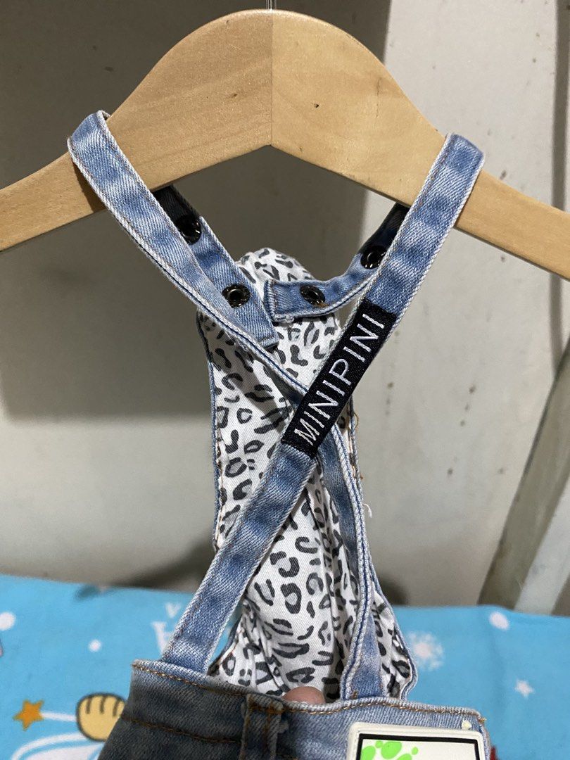 Minipini Denim Dog Overalls with Leopard Print Lining (Category: Homes & Other Pet Accessories) located in Manila. Submitted by resi.diaz (Listing ID 1462328213, Image 3). Description: - Adorable denim overalls for your pet - Features a fun leopard print lining - Adjustable straps for a comfortable and secure fit - Small pocket detail on the back - Perfect for stylish walks or everyday wear - Easy to put on and take off.