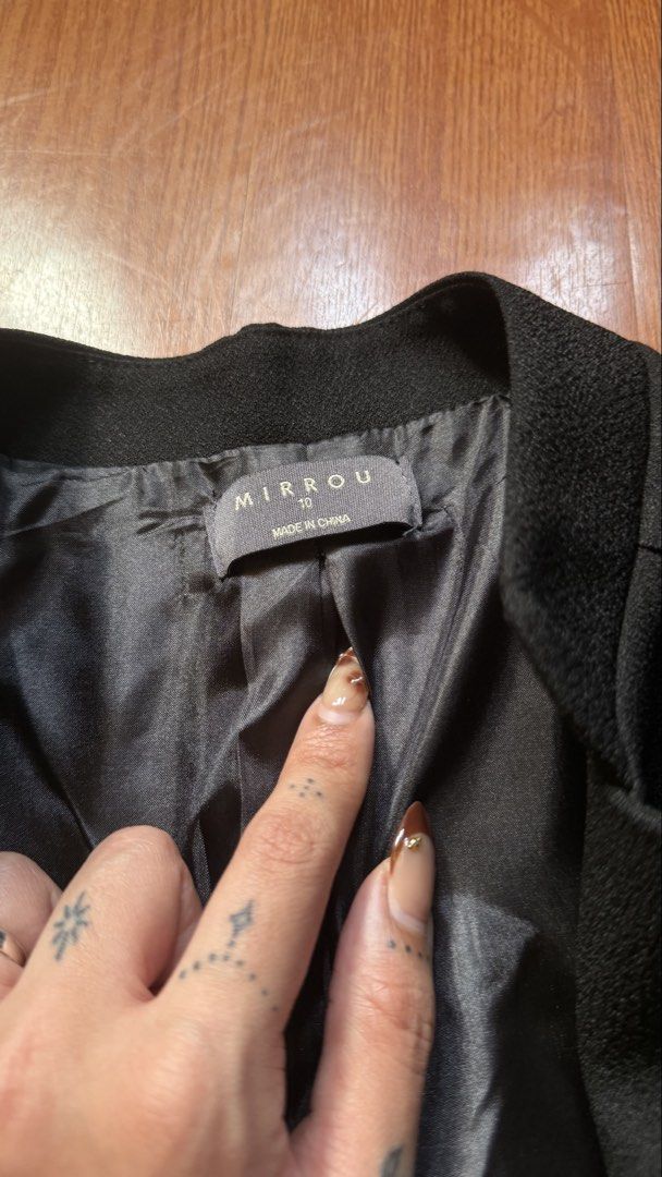 Mirrou Black Zipper Blazer Size 10 (Category: Coats, Jackets and Outerwear) located in Antipolo. Submitted by japanese.siomai (Listing ID 1462362905, Image 2). Description: - Black blazer from Mirrou - Unique zipper detail at the front - Fully lined interior - Perfect for dressing up or down - Size 10 - Made in China.