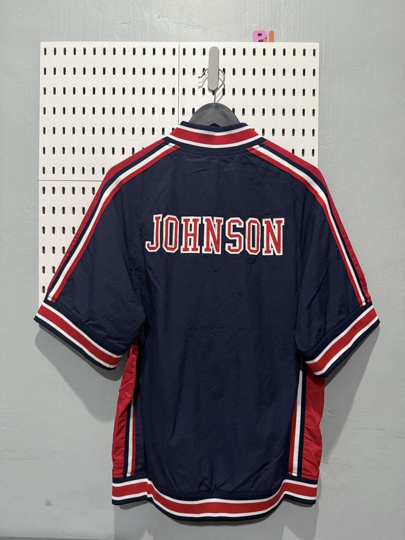 Mitchell & Ness Johnson USA Warmup Jacket (Category: Coats, Jackets and Outerwear) located in San Luis. Submitted by pjstatue (Listing ID 1462368169, Image 2). Description: - Authentic Mitchell & Ness USA Basketball Jacket - Size: 40 (Medium) - Color: Navy blue with red and white trim - Features 'JOHNSON' prominently on the back - Perfect for any basketball enthusiast.