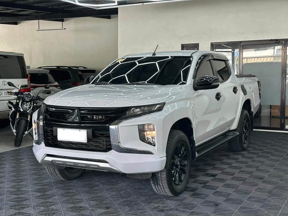 Mitsubishi Strada 2.4 GLS 4x2 Auto (Category: Used Cars) located in Manila. Submitted by quality_cars (Listing ID 1462275837, Image 3). Description: 2023 Mitsubishi Strada 2.4 GLS 4x2 AT Price: 978,000 For Sale Cash | Trade in | Financing HIGH and FAST APPROVAL!! FINANCING Downpayment: ₱268,000 ALL IN ‼️ INCLUSION: - Chattel Mortgage fee ✅ - Processing fees ✅ - Transfer of ownership fees ✅ 3yrs: ₱31,026 monthly 4yrs: ₱26,390 monthly 5yrs: ₱22,360
