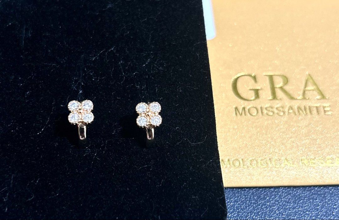 Moissanite Huggies Earrings (Category: Earrings) located in Marikina City. Submitted by decluttering.matters (Listing ID 1462394298, Image 3). Description: Moissanite earrings with clover design - Huggie hoop style - S925 - Silver setting in champagne gold color - Adorned with small moissanite stones - See photos for details FREE: dark red crystal necklace (new) No reservations. Payment first via GCash. First to pay gets the item. Shipping will b