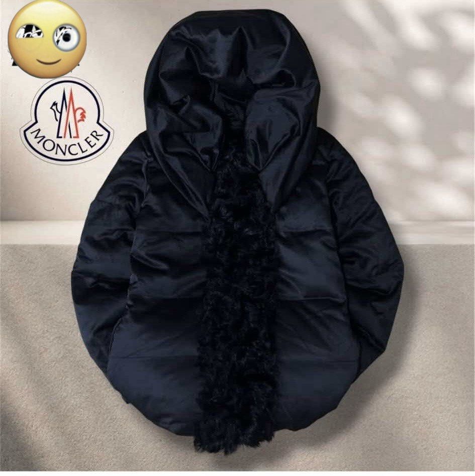 Moncler Black Puffer Jacket with Fur Trim (Category: Coats, Jackets and Outerwear) located in Quezon City. Submitted by bluefrenchorn (Listing ID 1462327882, Image 1). Description: - Moncler puffer jacket - Color: black - Cozy fur trim down the front - Designed for warmth and style in cold weather Measurements: 18x33 inches.