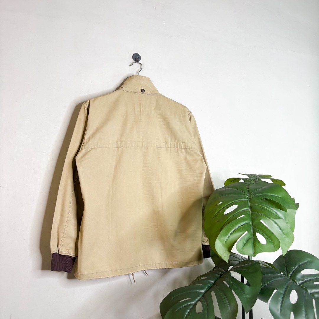 Montbell | Field Jacket. (Category: Coats, Jackets and Outerwear) located in Manila. Submitted by bypiecesandstories (Listing ID 1462266078, Image 2). Description: Montbell | Field Jacket. 799 PHP 🧡 Good Condition Can Fit — Small to Medium Dimensions — W 20.5" L 26" A practical field jacket with a clean and understated look. It’s the kind of piece you can easily wear with your everyday favorites, from casual days to weekend trips. *Has small dot