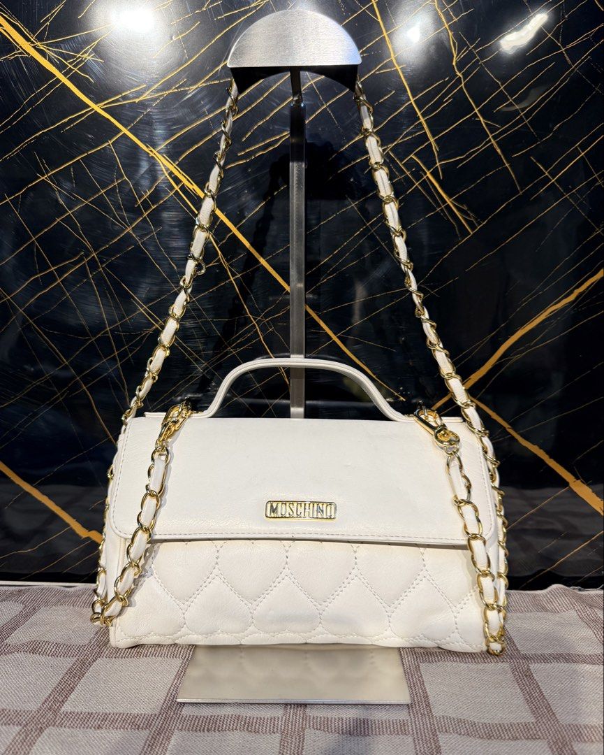 Moschino Patent Leather Shoulder bag (Category: Luxury Bags & Wallets) located in Santiago. Submitted by twicebutnice03 (Listing ID 1462305176, Image 1). Description: Authentic Moschino bag no issue As new condition Cam fit Phone and wallet.