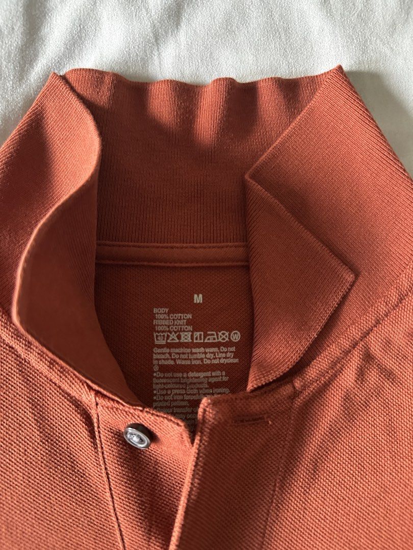 Muji Dark Orange Polo (M) (Category: Tshirts & Polo Shirts ) located in Muntinlupa City. Submitted by alabang__thrift (Listing ID 1462309859, Image 2). Description: .