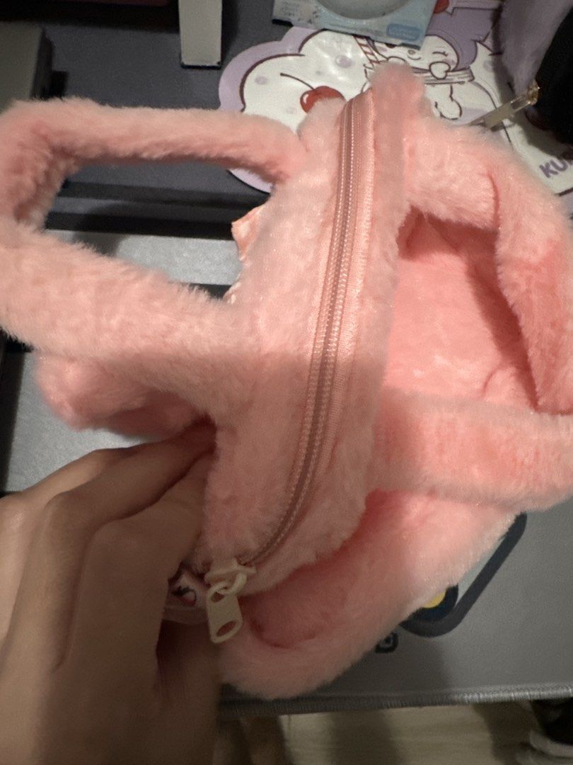 My Melody Plush Handbag with Gingham Bow (Category: Tote Bags) located in Manila. Submitted by lunalux09 (Listing ID 1462359342, Image 3). Description: - Adorable pink plush handbag featuring My Melody's face. - Cute gingham bow detail. - Secure zipper closure for your belongings. - Made with soft and fluffy material. - Ideal for carrying small essentials..