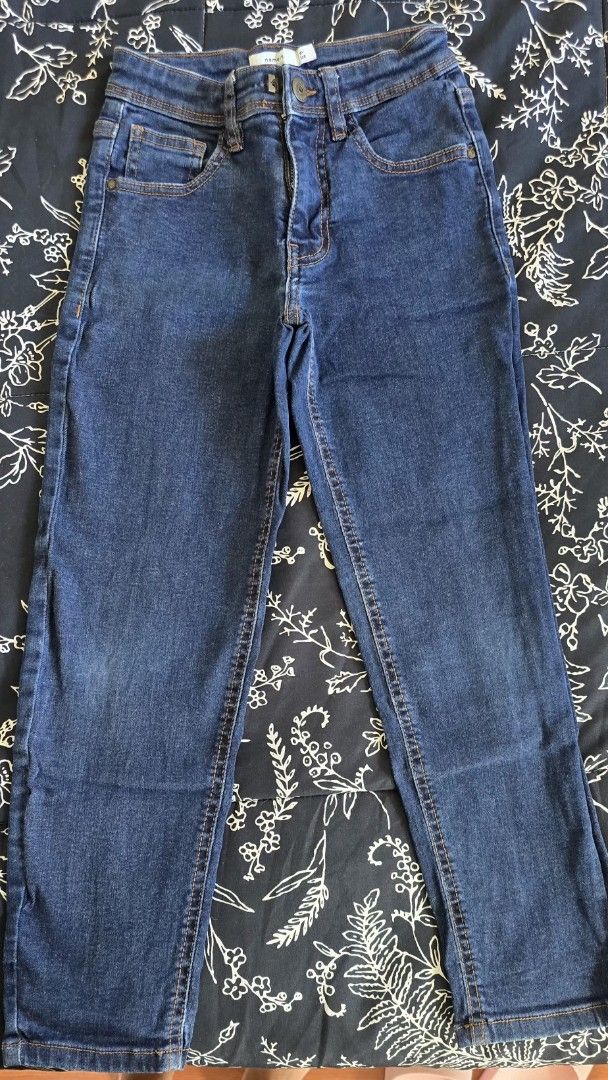 Name It Denim Jeans - Size 128 (Category: Babies & Kids Fashion) located in Calamba. Submitted by _arar_ (Listing ID 1462304541, Image 1). Description: - Dark wash denim jeans - High-waisted style - Straight leg cut - Button and zip closure - Five-pocket design - Measurements: Waist approx 26 inches, Inseam approx 27 inches - Perfect staple piece for any wardrobe.