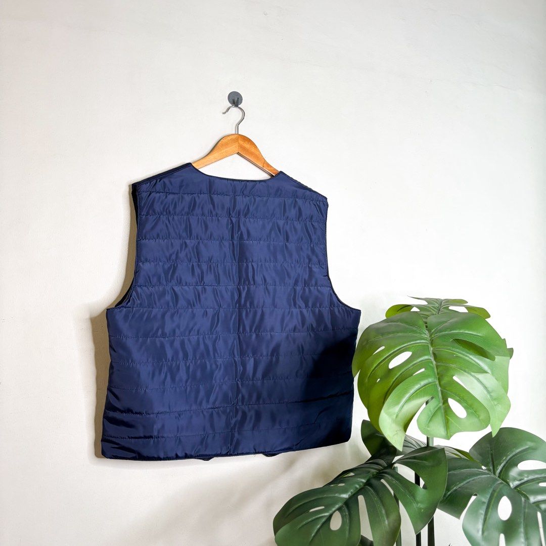 Navy | Nylon Vest. (Category: Vests) located in Manila. Submitted by bypiecesandstories (Listing ID 1462263665, Image 2). Description: Navy | Nylon Vest. 599 PHP 🧡 Perfect Condition Can Fit — Small to Large Dimensions — W 23" L 26" A classic navy vest that adds an effortless layer without overwhelming the rest of your outfit. Pair it with a shirt, tee, or sweater for a relaxed look with just the right amount of detail. Shipping Fee — 64 PHP 📦 •