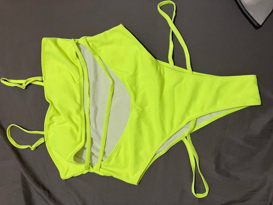 Neon Yellow Bikini Set with Floral Print Top (Category: Bikinis & Swimsuits) located in Manila. Submitted by jenicamarieperlada31.storm (Listing ID 1462280121, Image 2). Description: Selling my slightly used swimsuit used once for photo ops only large to xl sizes Shein rfs: Nakatambak nalang.