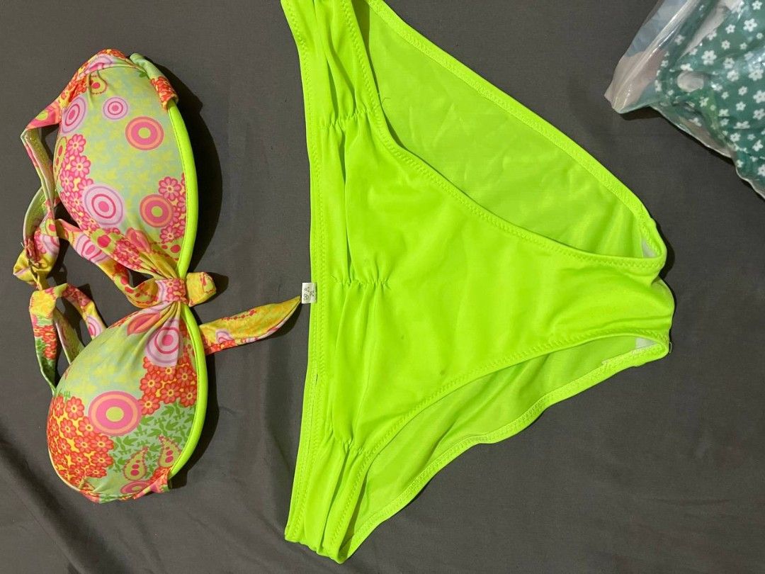 Neon Yellow Bikini Set with Floral Print Top (Category: Bikinis & Swimsuits) located in Manila. Submitted by jenicamarieperlada31.storm (Listing ID 1462280121, Image 1). Description: Selling my slightly used swimsuit used once for photo ops only large to xl sizes Shein rfs: Nakatambak nalang.