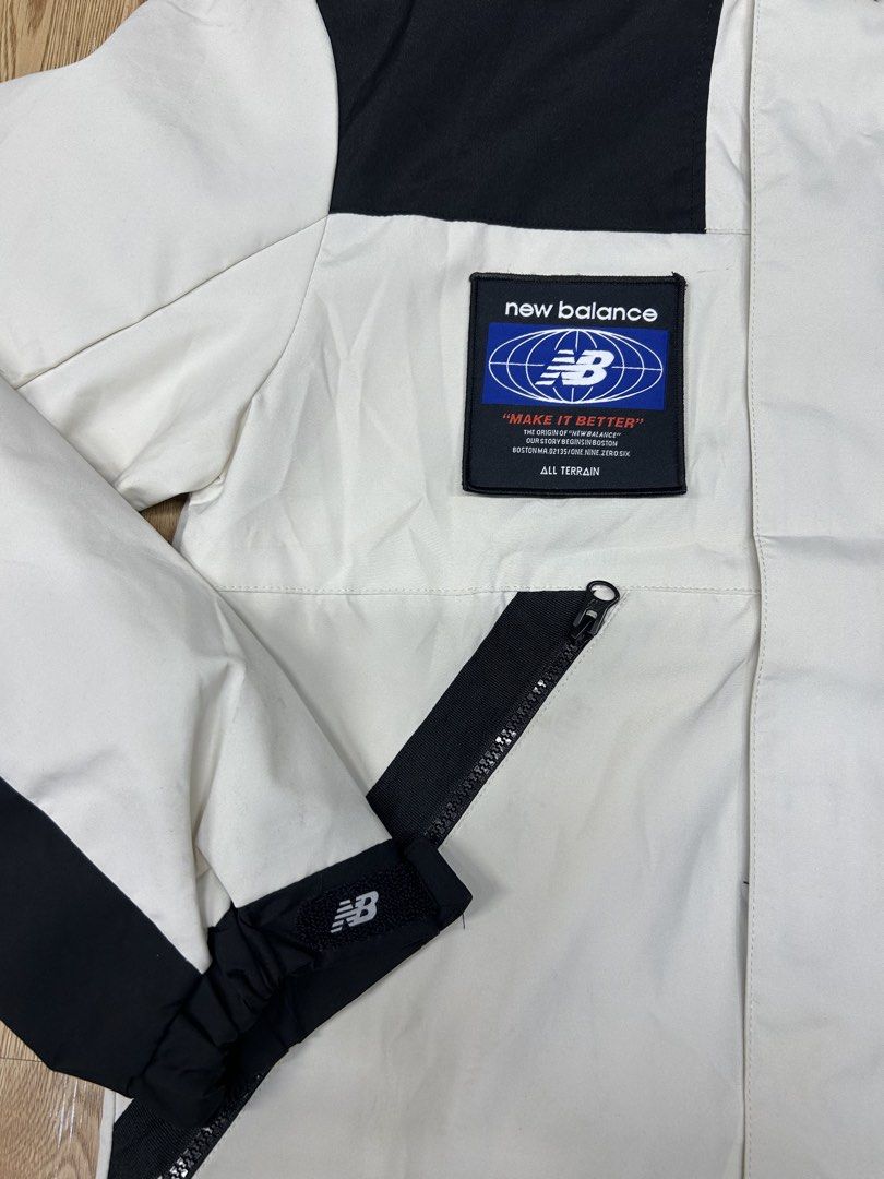 New Balance All Terrain Jacket White Black (Category: Coats, Jackets and Outerwear) located in Manila. Submitted by bodegabodega (Listing ID 1462313155, Image 2). Description: - Cool New Balance jacket - White with black accents - Features a hood - Multiple pockets for storage - Ideal for outdoor activities - New Balance logo and 'All Terrain' patch - Globe patch on the sleeve - Ready for your next adventure Medium fit to large 21x27 2.5k.