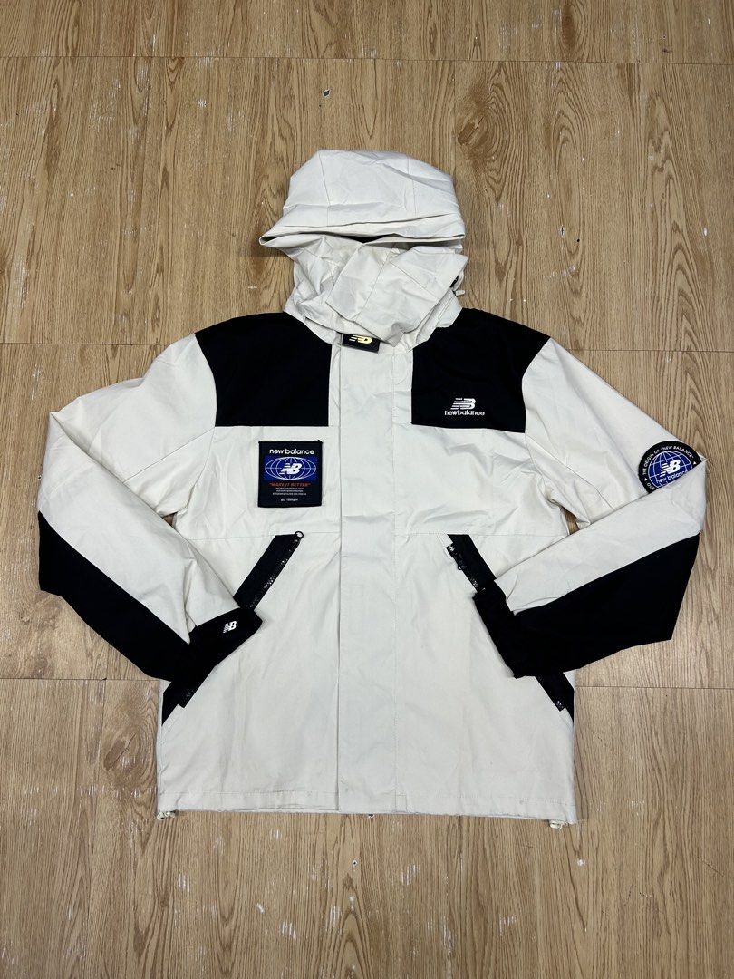 New Balance All Terrain Jacket White Black (Category: Coats, Jackets and Outerwear) located in Manila. Submitted by bodegabodega (Listing ID 1462313155, Image 1). Description: - Cool New Balance jacket - White with black accents - Features a hood - Multiple pockets for storage - Ideal for outdoor activities - New Balance logo and 'All Terrain' patch - Globe patch on the sleeve - Ready for your next adventure Medium fit to large 21x27 2.5k.