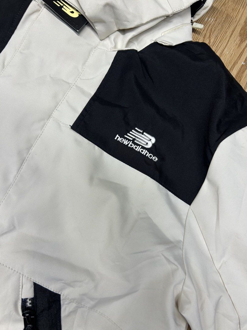 New Balance All Terrain Jacket White Black (Category: Coats, Jackets and Outerwear) located in Manila. Submitted by bodegabodega (Listing ID 1462313155, Image 3). Description: - Cool New Balance jacket - White with black accents - Features a hood - Multiple pockets for storage - Ideal for outdoor activities - New Balance logo and 'All Terrain' patch - Globe patch on the sleeve - Ready for your next adventure Medium fit to large 21x27 2.5k.