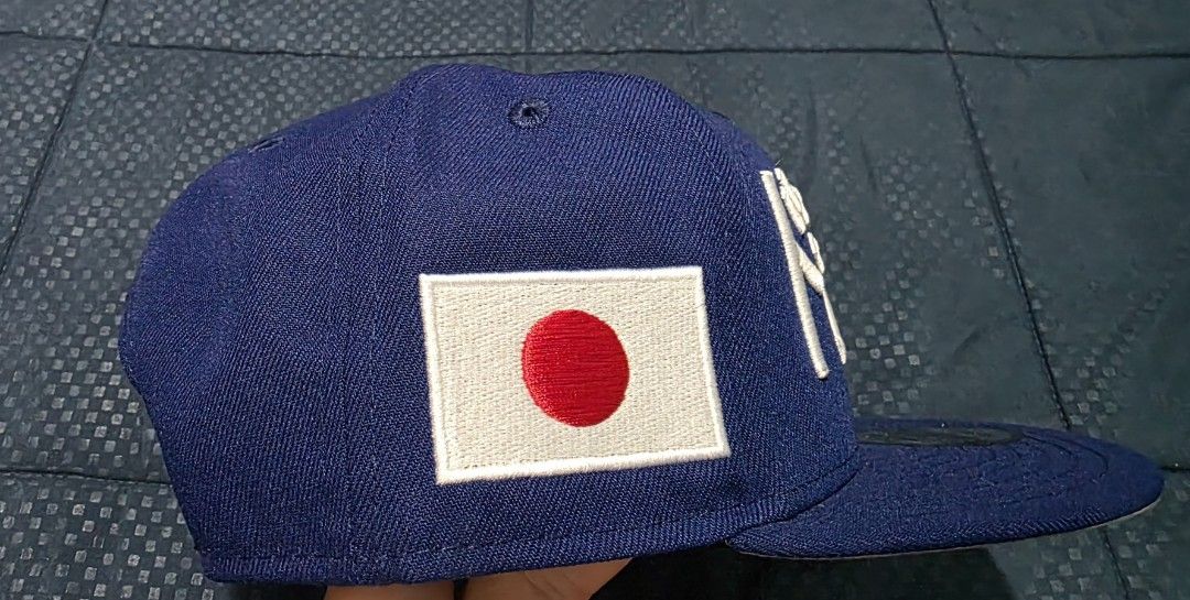 New Era 9FIFTY Snapback Hat - Blue with Japanese Text (Category: Caps & Hats) located in Santa Rosa. Submitted by rowhell09 (Listing ID 1462389237, Image 3). Description: Dodgers Kanji Blue Brandnew 2300 MOD. LBC MOP. BDO, GCASH LOC. NUEVA ECIJA - Brand: New Era - Style: 9FIFTY Snapback - Color: Blue - Features: Japanese text on front, Japanese flag on side - Closure: Adjustable snapback - Perfect for hat collectors.
