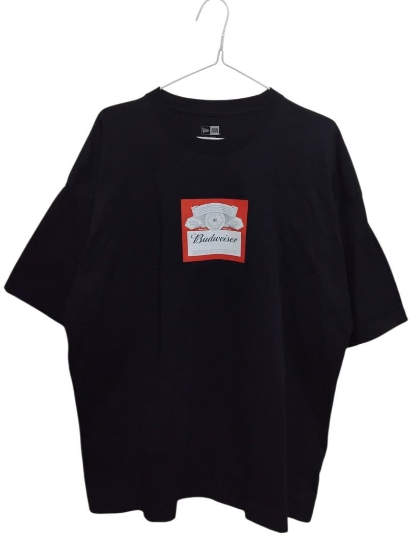 New Era x Budweiser Logo Graphic Tee (Category: Tshirts & Polo Shirts ) located in Pasig City. Submitted by hustlexcurate (Listing ID 1462392126, Image 1). Description: New Era x Budweiser Logo Graphic Tee Size XXL Dimensions: 24X28.