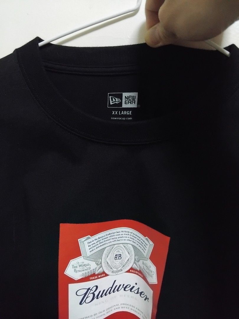 New Era x Budweiser Logo Graphic Tee (Category: Tshirts & Polo Shirts ) located in Pasig City. Submitted by hustlexcurate (Listing ID 1462392126, Image 3). Description: New Era x Budweiser Logo Graphic Tee Size XXL Dimensions: 24X28.