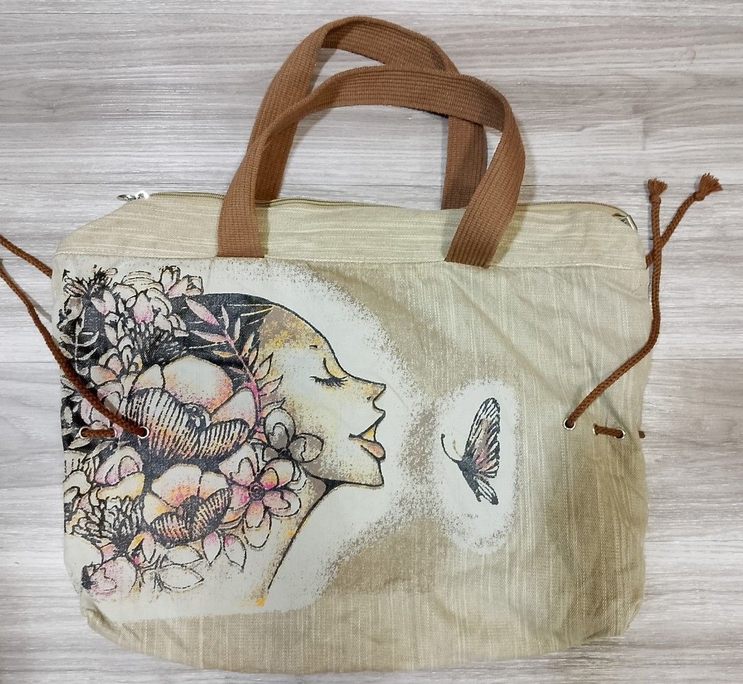 New Thai Style Canvas Tote Bag (Category: Tote Bags) located in Caloocan City. Submitted by pvaliao (Listing ID 1462358624, Image 1). Description: New Thai Style Canvas Tote Bag Fabric: Canvas plain woven cotton fabric Size: 19 inches × 15 INCHES Pre owned Price: 150 pesos Buy it now!.