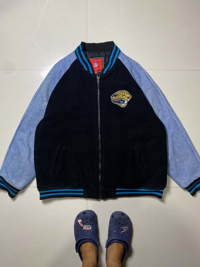 NFL Jacksonville Jaguars Varsity Jacket (Category: Coats, Jackets and Outerwear) located in Tabaco. Submitted by byvinxent (Listing ID 1462264846, Image 1). Description: Details: Black wool body with denim-mix sleeves and embroidered Jacksonville Jaguars graphics on front and back. X-large 28 length 28 width Pm if interested 📩📩📩 Albay, Bicol📍.