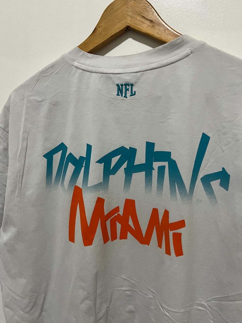 NFL Miami Dolphins (Category: Tshirts & Polo Shirts ) located in Oroquieta. Submitted by zjstg (Listing ID 1462379278, Image 2). Description: NFL Large 23/28 Need wash Tight neck 300+sf.