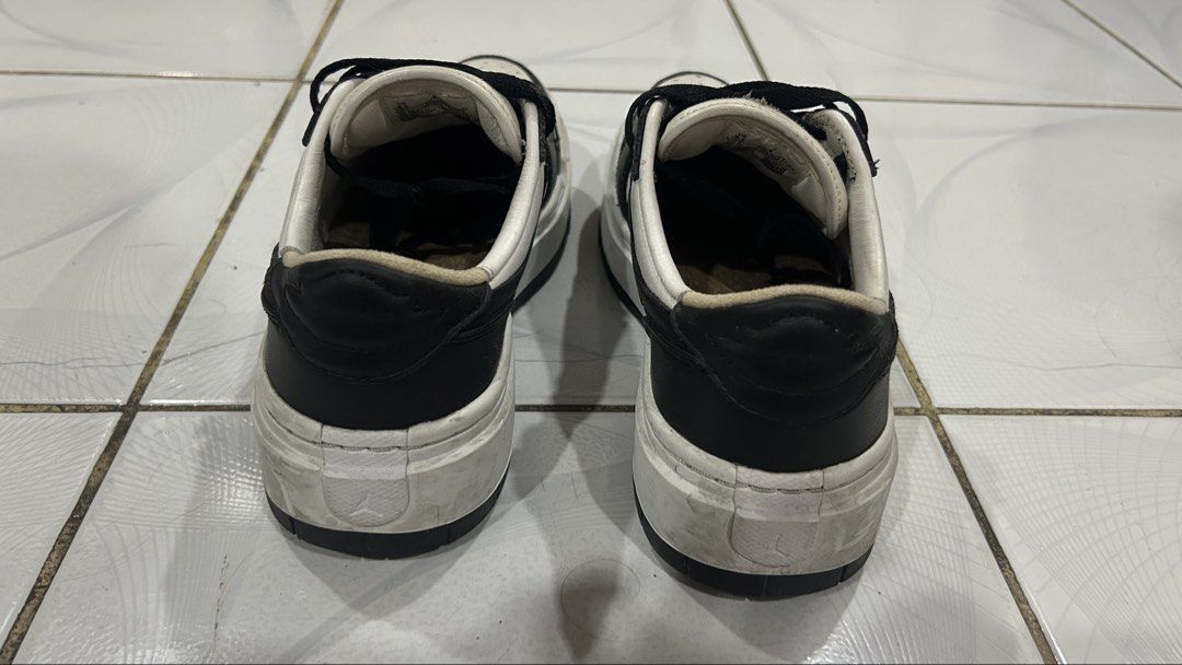 Nike Air Jordan 1 Low Elevate Sneakers (Category: Sneakers) located in Manila. Submitted by truefire-0c7f (Listing ID 1462411565, Image 3). Description: - Black and white low-top Jordans - Features thick white platform soles - Black laces NEGOTIABLE.