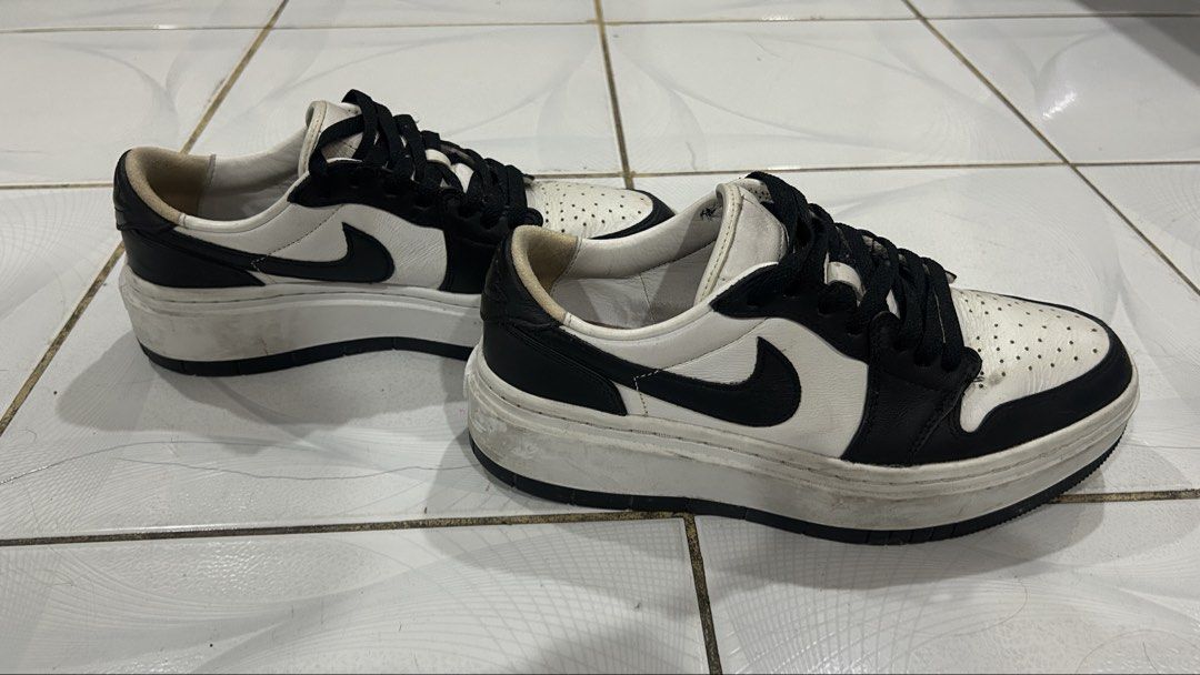 Nike Air Jordan 1 Low Elevate Sneakers (Category: Sneakers) located in Manila. Submitted by truefire-0c7f (Listing ID 1462411565, Image 2). Description: - Black and white low-top Jordans - Features thick white platform soles - Black laces NEGOTIABLE.