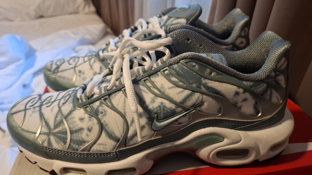 Nike Air Max Plus Tie-Dye Sneakers (Category: Sneakers) located in Manila. Submitted by shoedreamworkz (Listing ID 1462434589, Image 2). Description: - Nike Air Max Plus sneakers - Cool tie-dye pattern - White and blue/green colorway - Lace-up closure - Original Nike box included - Please note: Box has some damage.