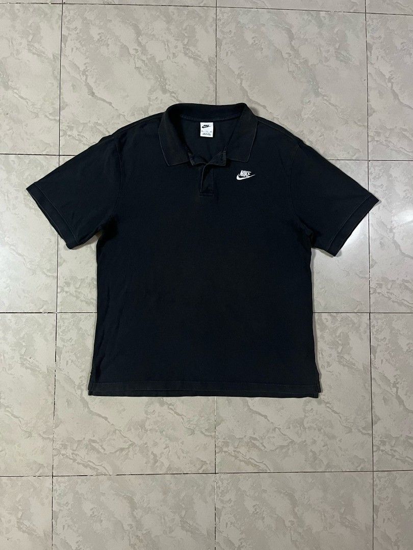 Nike Black Polo Shirt (Category: Tshirts & Polo Shirts ) located in Manila. Submitted by bognalosjo69319 (Listing ID 1462335873, Image 2). Description: - Classic black Nike polo shirt - Short sleeves with collar and button placket - Iconic embroidered Nike swoosh logo on chest - Versatile for everyday casual or sporty wear.