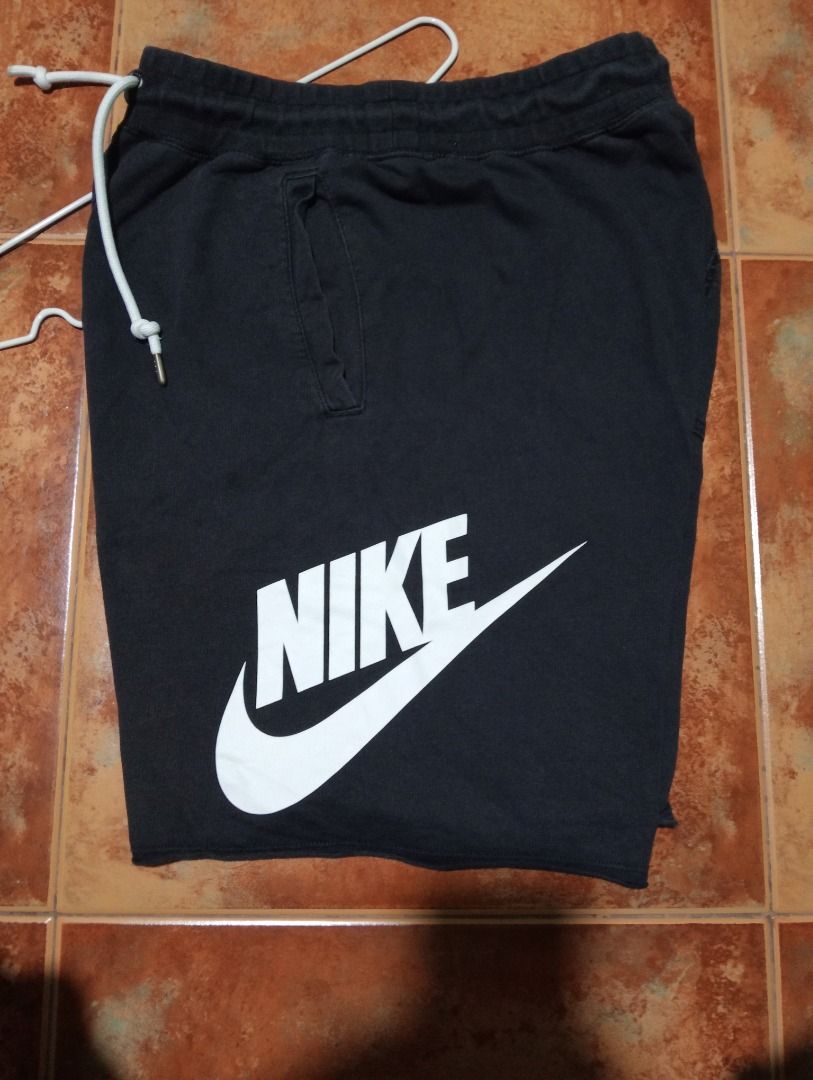 Nike Black Shorts Size M (Category: Shorts) located in Caloocan City. Submitted by yazzielux (Listing ID 1462432852, Image 3). Description: - Black Nike Shorts - Size: Medium (M) - Classic Nike logo on leg - Elastic waistband with drawstring for adjustable comfort - Versatile: Great for casual wear or sports - Made in China.