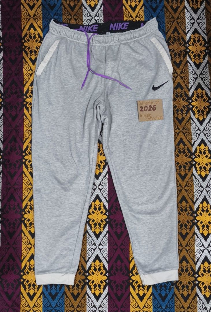 Nike Dri-Fit Grey Sweatpants XL (Category: Joggers) located in Pasig City. Submitted by althentic.ph (Listing ID 1462274815, Image 1). Description: 350 + JNT SF *Original NIKE Jogger For Men With Side Pockets Size XL on tag Actual Measurements: Waist - 36"-38" Length - 39" Knee - 10" Leg Opening - 6" Very Good Thrifted Condition 9/10 Normal sign of usage ✔Tags are available upon request, can be sent thru PM ✔fix price ✔payment first policy thru g
