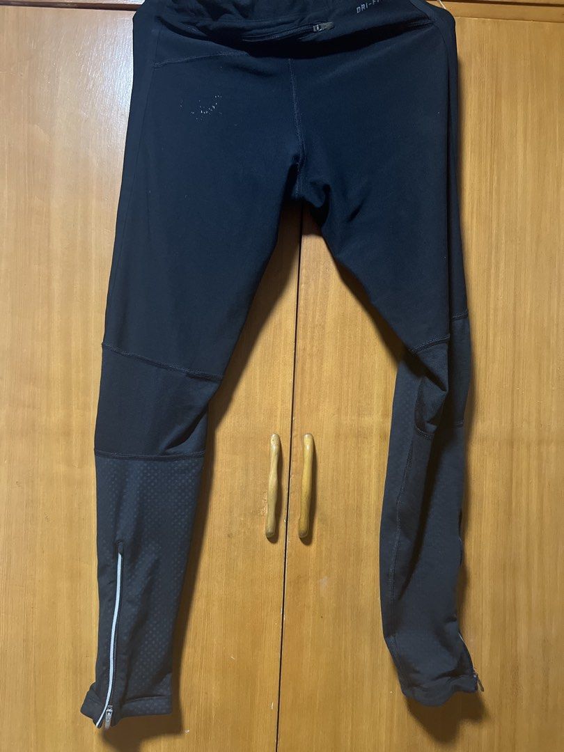 Nike Dri-Fit Running Tights Black Size M (Category: Activewear) located in Pasig City. Submitted by zebteashoppe01 (Listing ID 1462371774, Image 2). Description: - Black Nike Dri-Fit running tights - Size: Medium (M) - Made in Cambodia - Zippers at the ankle - Reflective details on the sides for enhanced visibility - Ideal for workouts and running Medium but fits small to medium Mop 09096535540 Jnt Pasig.