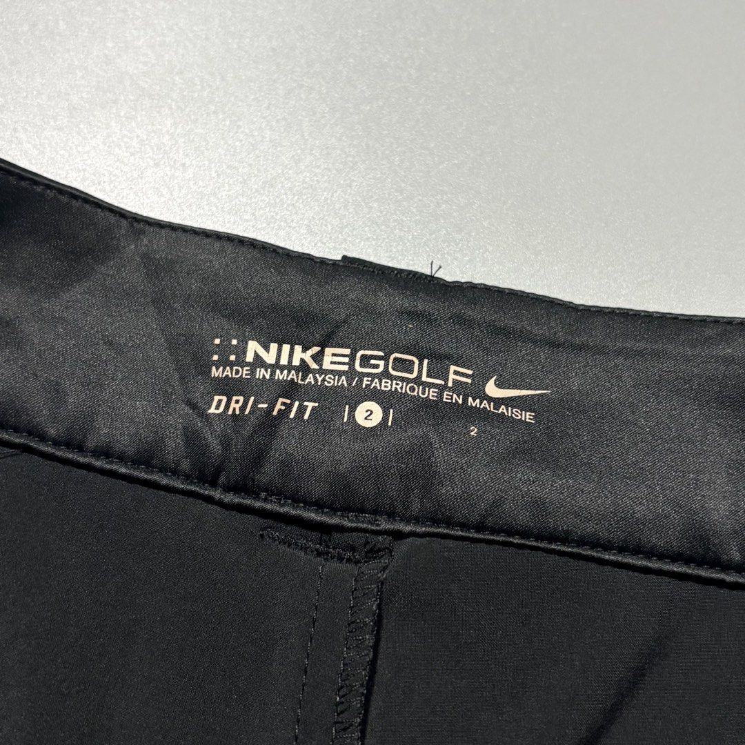 Nike Golf 2000s Dri-FIT Black Skort (Category: Activewear) located in Tayabas. Submitted by tayabaskartell (Listing ID 1462407344, Image 3). Description: Nike Golf 2000s Dri-FIT Black Skort Clean 2000s Nike Golf Dri-FIT skort with dual front buttons and tonal swoosh embroidery..