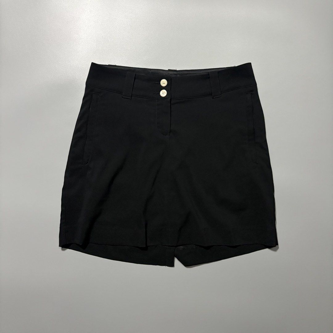 Nike Golf 2000s Dri-FIT Black Skort (Category: Activewear) located in Tayabas. Submitted by tayabaskartell (Listing ID 1462407344, Image 1). Description: Nike Golf 2000s Dri-FIT Black Skort Clean 2000s Nike Golf Dri-FIT skort with dual front buttons and tonal swoosh embroidery..