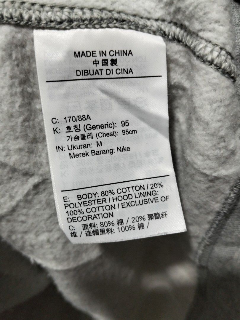 Nike Grey Hoodie Sweatshirt Pullover Size M (Category: Coats, Jackets and Outerwear) located in Manila. Submitted by brarynpag30556 (Listing ID 1462288485, Image 3). Description: - Classic grey Nike hoodie - Small embroidered Nike logo on chest - Comfortable cotton and polyester blend - Adjustable hood with drawstring - Convenient kangaroo pocket - Ideal for casual wear.