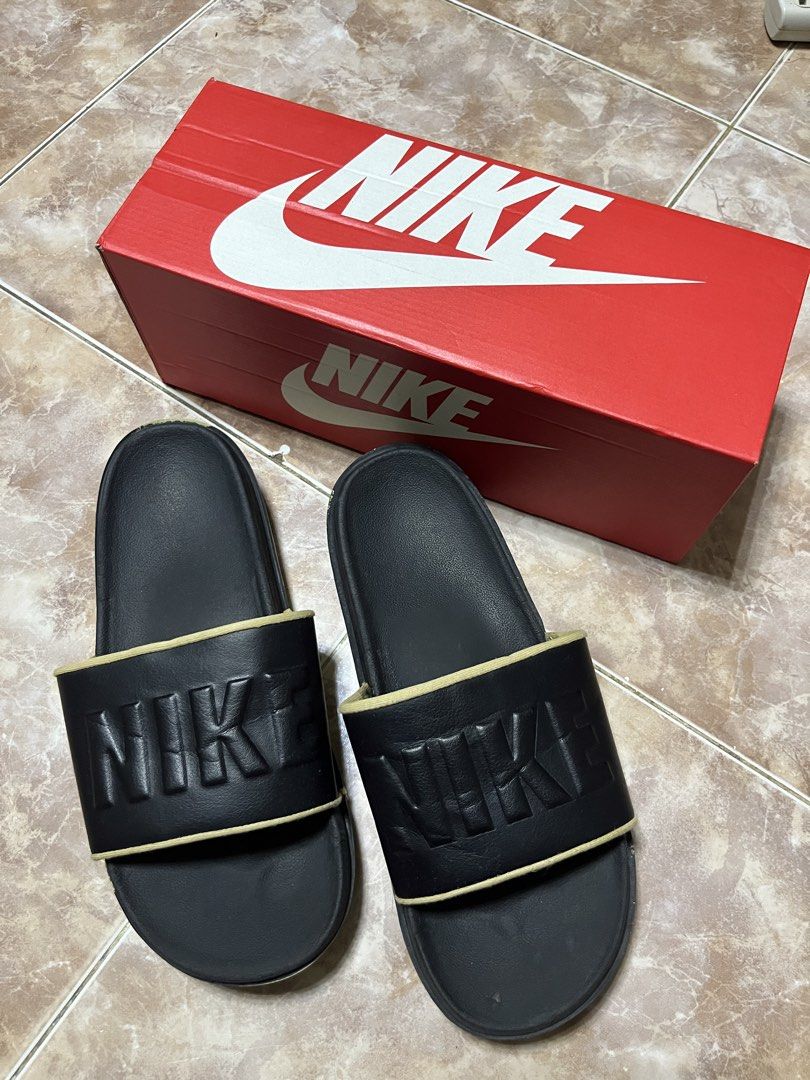Nike Off court Slides (Category: Slippers & Slides) located in Iligan City. Submitted by curatedthrift.26 (Listing ID 1462317070, Image 1). Description: Nike Off court Slides authentic size 10 on tag Issue: stitched bottom negotiable .