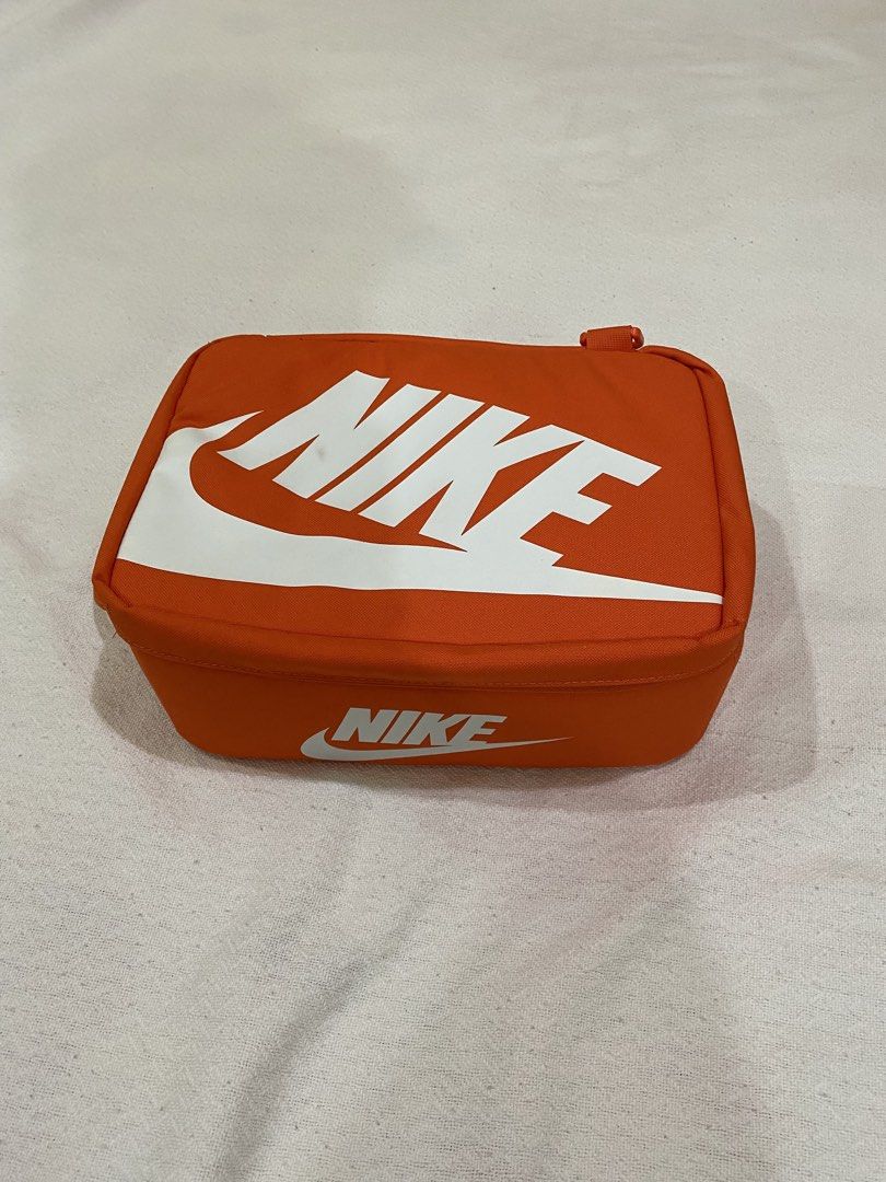 Nike orange shoe box (Category: Shoe inserts & accessories) located in Morong. Submitted by aa.vinmy (Listing ID 1462308229, Image 1). Description: Measurements L12/5 × W8/5 xH4/5 8 liters capacity No tears or damage Flaws: May dumi lang sa N Delivery via jnt Meet up: Morong Bataan or Olongapo city Pm. For more details .